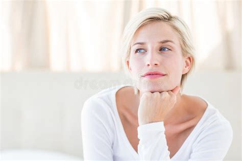 Pretty Blonde Woman Sitting On The Bed Stock Photo Image Of Female
