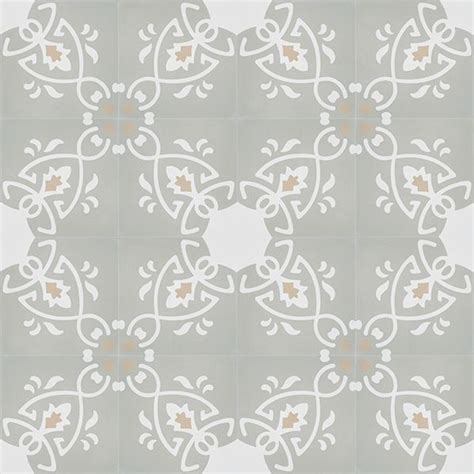 A White And Gray Tile With An Intricate Design