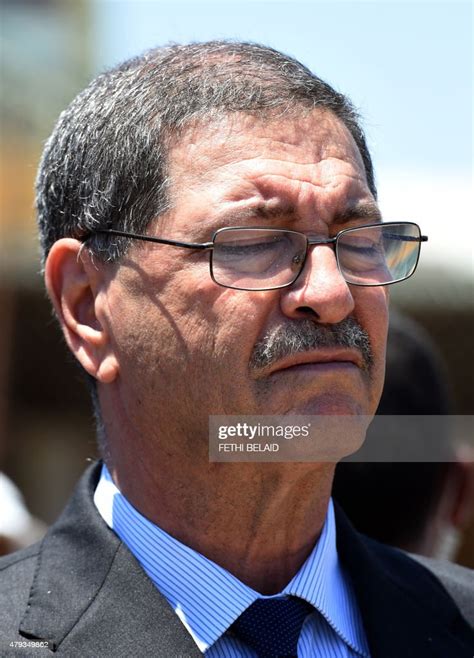 tunisian prime minister habib essid closes his eyes as he observes a news photo getty images