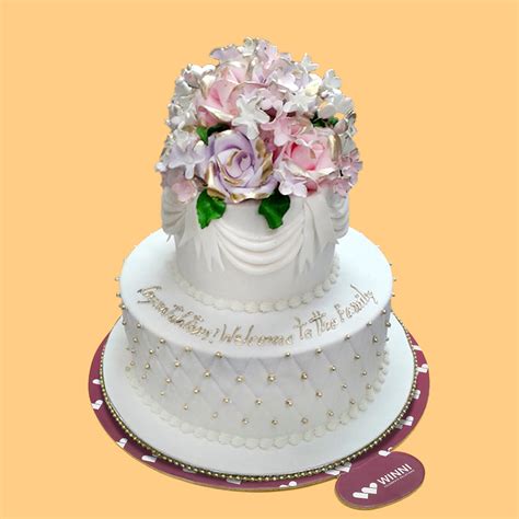 3 tier round shape cake with stand buy now; Symbol of Love Wedding Cake | Winni
