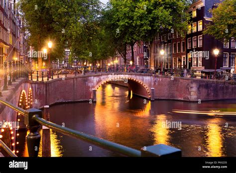 Beautiful Night Scene From The City Of Amsterdam In The Netherlands