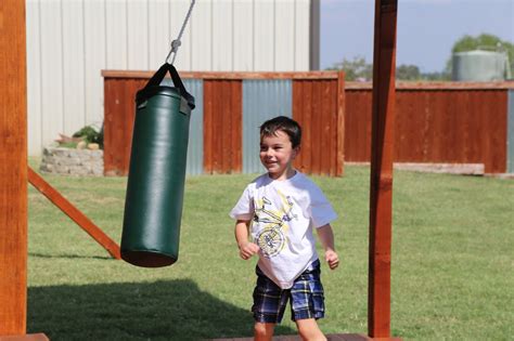 Punching Bag - Green | Swing set, Kids punching bag 