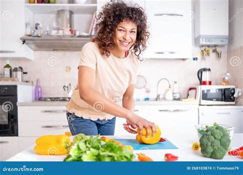 Cheerful Black Woman Cooking At Home Looking A The Camera Stock Photo Image Of Hobby Home