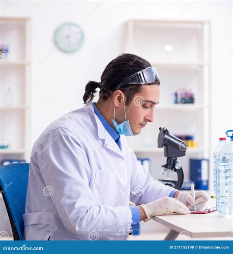 Young Male Chemist Experimenting In Lab Stock Photo Image Of Chemical