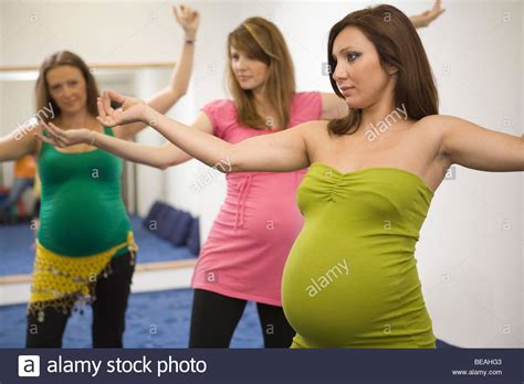 Nicola 4 months pregnant and dancing to j. Pregnant women dancing belly dance Stock Photo - Alamy
