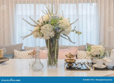 Luxury Table Set On Dinnig Table With Vase Of Flower In Dining R Stock