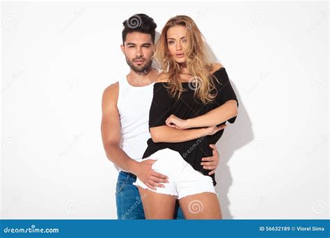 Young Man Holding His Girlfriend From Behind Stock Photo Image 56632189