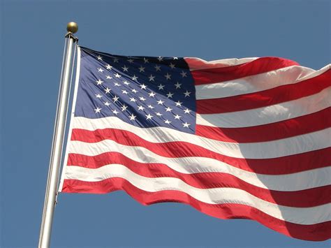 Flags United States Free Stock Photo A Us Flag Flying In The Wind