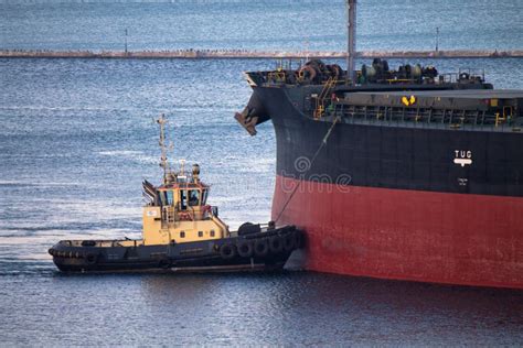 Ship Berthing At Port With Tug Assistance Stock Photo Image Of Help