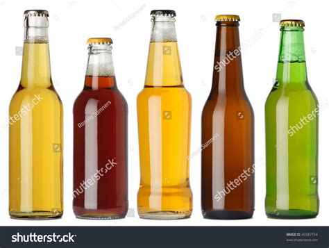Photo Of Five Different Full Beer Bottles With No Labels Separate