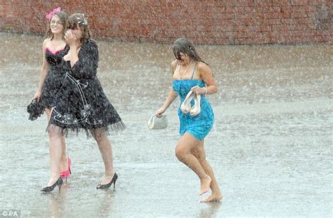 Not So Glorious Goodwood Race Goers Take Shelter From Another Summer