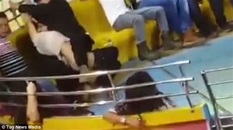 Babefriend Tries To Cover His Girlfriend After Funfair Ride Makes Her Trousers Fall Down Daily