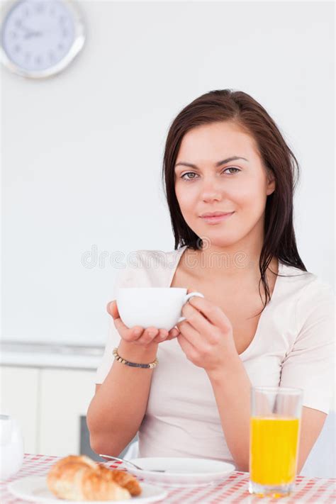 Portrait Of A Cute Brunette Having Her Breakfast Stock Photo Image Of Female Bowl
