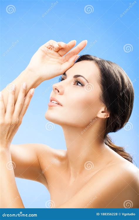 Woman With Naked Shoulders On Blue Stock Photo Image Of Glamorous