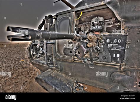 A High Dynamic Range Image Of A Uh 60 Black Hawk Door Gunner Manning A
