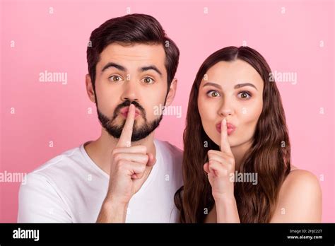 Photo Of Beautiful Couple Finger Cover Lips Ask Keep Quiet Secret Wear Casual Outfit Isolated