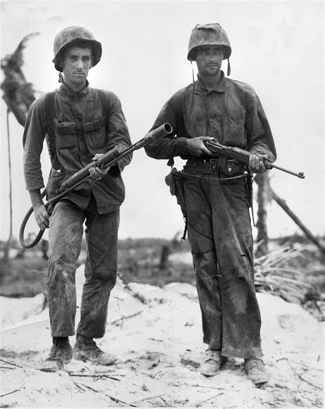 Two Us Marines On Peleliu 1944 The Marine On Left Is Armed With An