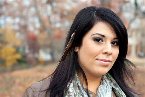 Beautiful Young Hispanic Woman Wearing Custom Feather Hair Extensions