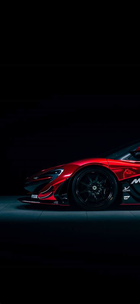 Download Majestic Red Mclaren P1 Gtr Parked On A Racetrack Iphone