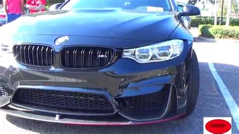 The competition package is a significant. The 2015 BMW M4: All black with carbon fiber trim!! - YouTube