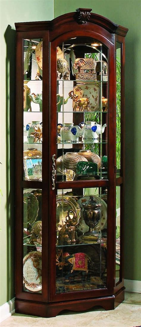 To kick off our top ten corner curio cabinets is this elegant glass corner cabinet in a cherry finish. Medallion Cherry Finish Corner Curio Cabinet - | Vitrinas ...