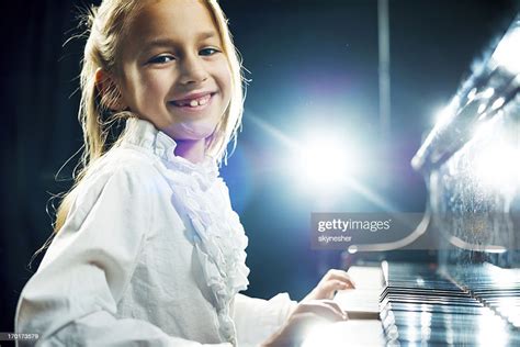 Little Girl Playing Piano High Res Stock Photo Getty Images