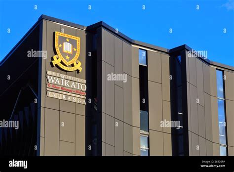 The Logo Of The University Of Waikato On Their Campus Building In