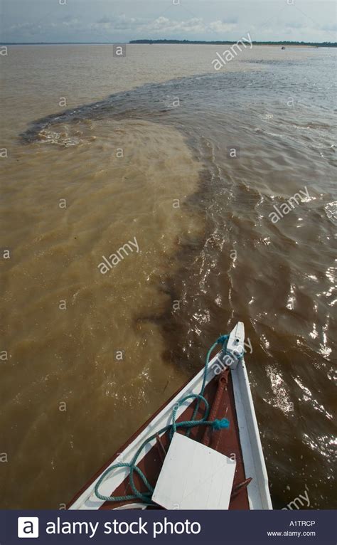 The Bow Of A Boat At The Meeting Of The Waters Confluence Of The Rios
