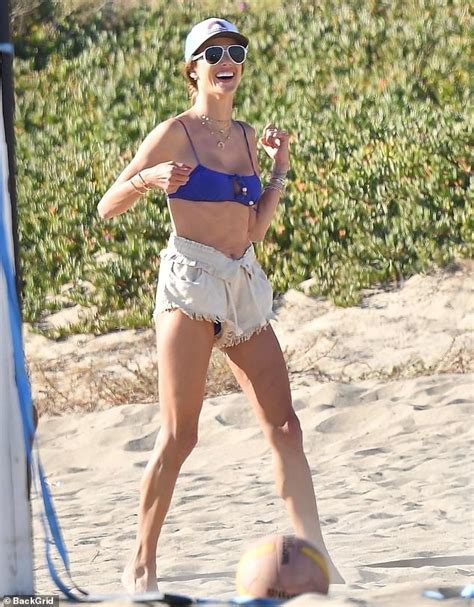 Alessandra Ambrosio Puts On A Cheeky Display In Shorts While Playing Beach Volleyball ReadSector