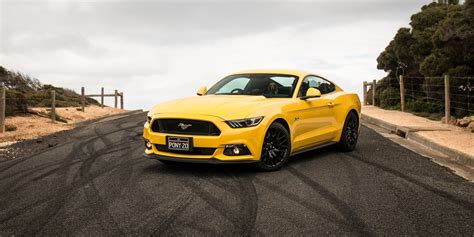 Yellow Sports Car Ford Mustang On The Track Wallpapers And Images
