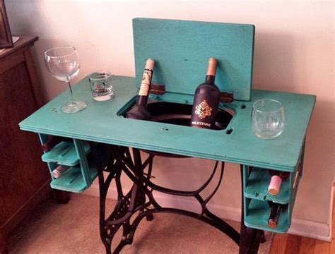I'd leave the top bare and take out the rug below. Creative ways to reuse your old sewing machine table | The Owner-Builder Network