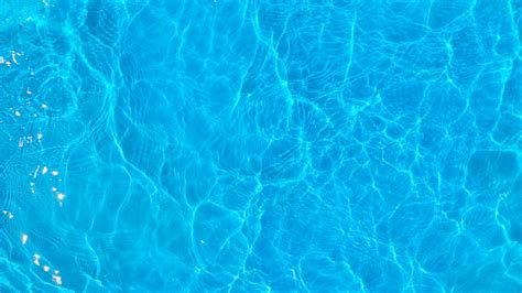 Blue Ripple Water In Swimming Pool Surface Of Water In Blue Texture