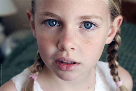 Fair Skinned Freckled Face Blonde In Braids By Stocksy Contributor Dina Marie Giangregorio