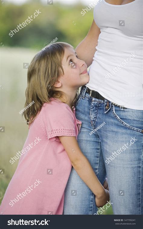 Cute Little Girl Hugging Her Mothers Stock Photo 147799241 Shutterstock