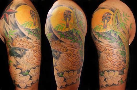 Filipino Half Sleeve Tattoo Features The National Bird And Flower Of