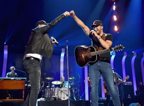 Luke Bryan Brings Out Cole Swindell For Roller Coaster Performance