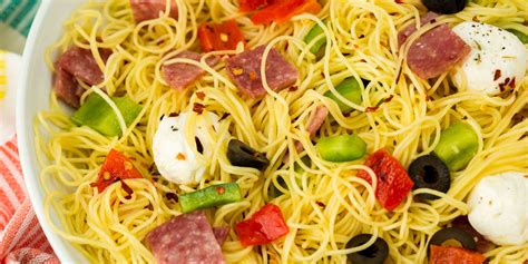 Toss the pasta with 1 tablespoon of the cooking oil and 2 tablespoons of the sesame oil. Easy Italian Angel Hair Salad Recipe - How to Make Italian ...