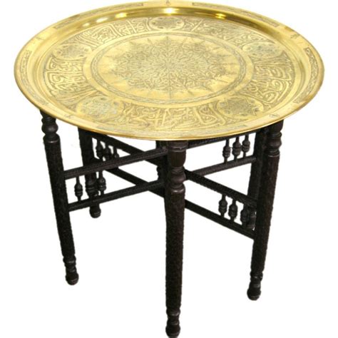 Finished wood, brass, glass, acrylics & more. Turkish Antique Brass coffee table at 1stdibs