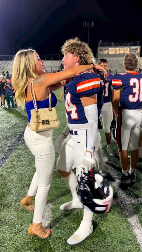 Moms Straddling Hug With Teen Son At Football Game Goes Viral