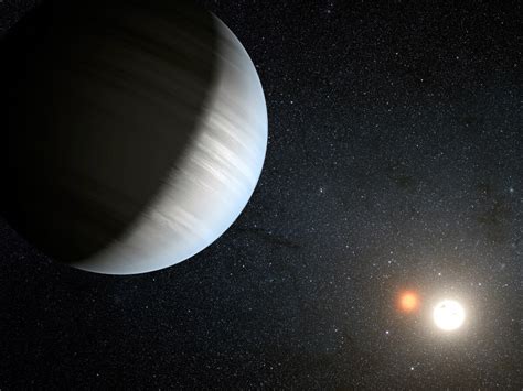 Double Planets Found Orbiting Twin Stars