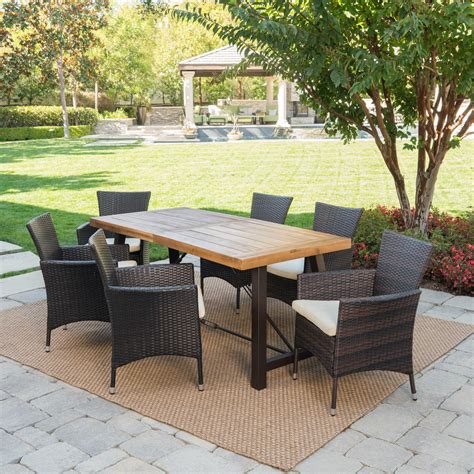 Phoenix Outdoor 7 Piece Dining Set With Wood Table And Wicker Dining