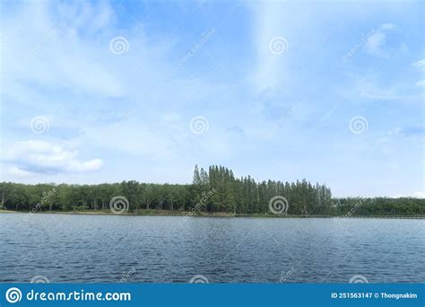 Landscape View Of Nature Reservoir With Light Waves Along The Wooden