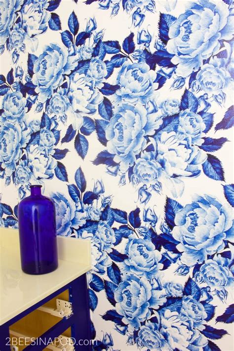 Give your walls an immediate transformation with this wallpaper! Bold Floral Blue and White Removable Wallpaper - One Room ...