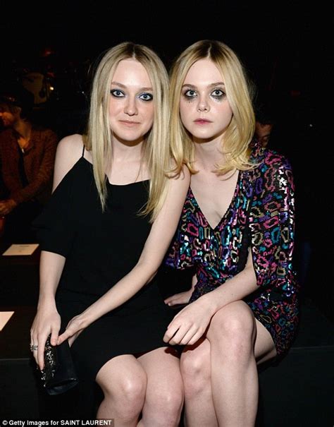 Dakota And Elle Fanning Dare To Be Different At Saint Laurent Show Daily Mail Online