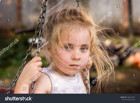 Cute Little Girl On Swing Sad Stock Photo 1580253991 Shutterstock