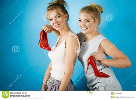 Women Presenting High Heels Shoes Stock Photo Image Of Fashion Happy