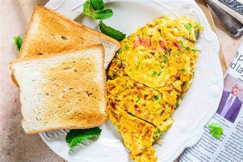 Indian style egg omelet or omelette with some spices and fresh herbs. Indian Masala Omelette is a super quick egg recipe which ...
