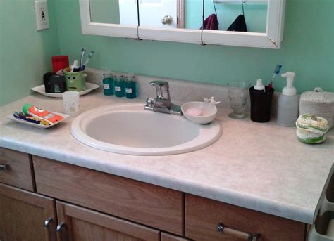 Open shelves while bathroom vanities are a great solution, sometimes, the sink and plumbing underneath take up too much space. Vanity Organization Ideas: The Instant Tricks - HomesFeed