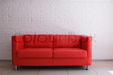 Rød Sofa Og Hvid Mur Stock Foto Colourbox