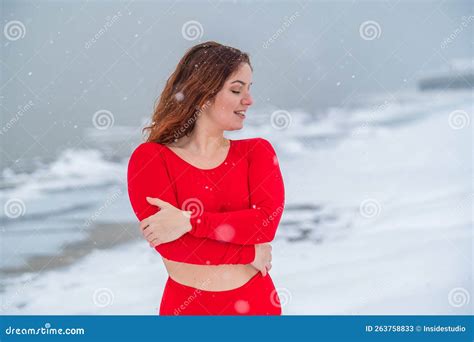 Caucasian Red Haired Woman Posing In Lingerie Outdoors In Winter Stock